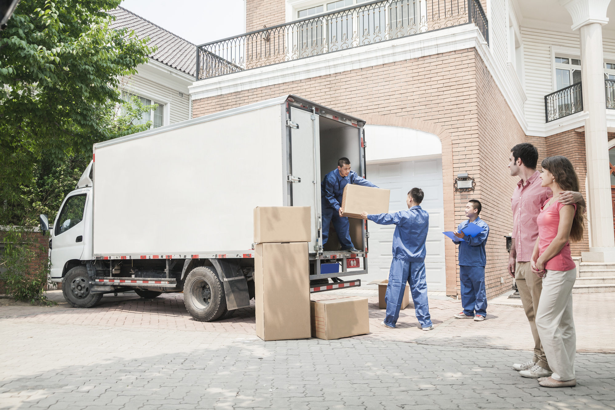 Movers unloading a truck